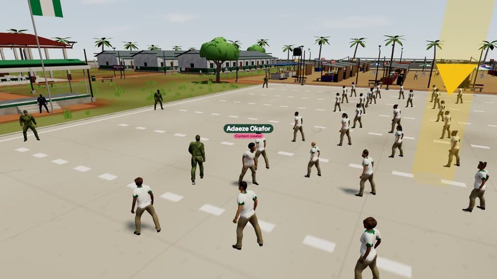In-game screenshot: corpers in white kit spread across the camp parade ground, with soldiers and the camp buildings behind